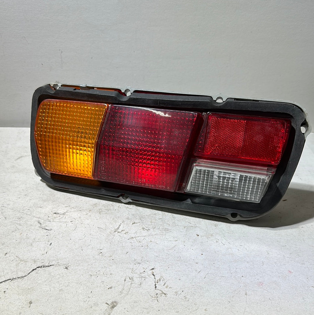 81560-12201 - TOYOTA LAMP REJ.